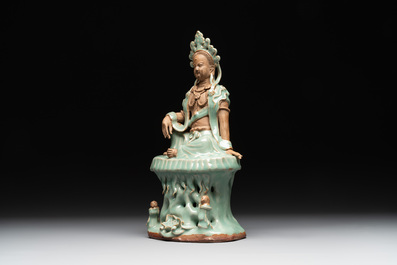 A Chinese Longquan celadon Guanyin, Ming or later