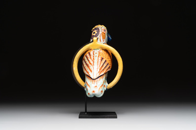 A polychrome Dutch Delft parrot on a later metal stand, 18/19th C.