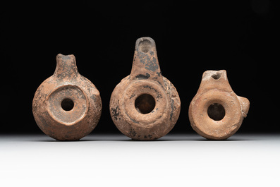 A 18-piece study collection of stoneware mugs, drinking vessels, pottery and stoneware oil lamps, mainly Germany, 15th C. and later