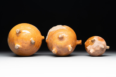 A collection of 10 parcel-glazed pottery so-called &lsquo;grapen&rsquo;, tripod cooking pots, 14th/17th C.
