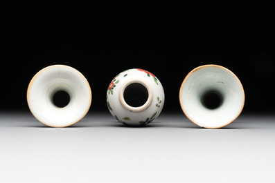 A Chinese famille rose tea caddy, two covered milk jugs and three vases, Yongzheng/Qianlong