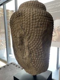 A Thai sandstone head of Buddha, possibly Ayutthaya period, 14/15th C.