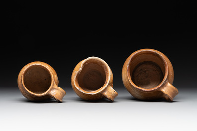 A collection of 10 German stoneware mugs, 14/16th C.