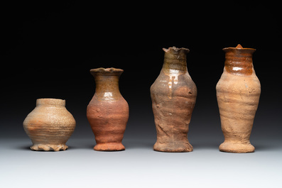 A collection of 9 German proto stoneware jugs and vessels, 14th C.