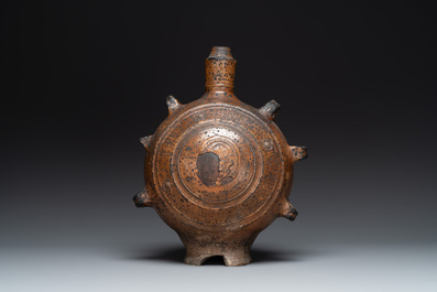 Five stoneware jugs or pilgrim flasks, including a Raeren example with armorial design, 16/17th C. and later