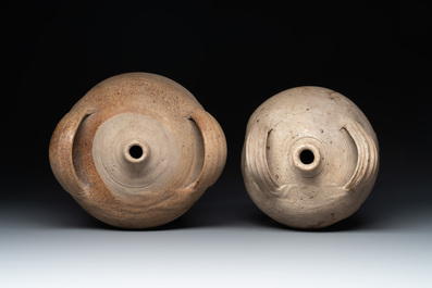 Five stoneware jugs or pilgrim flasks, including a Raeren example with armorial design, 16/17th C. and later