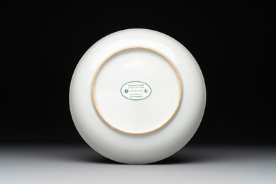 A Chinese famille rose 'Lowestoft' teapot, a plate, three cups and nine saucers, Qianlong