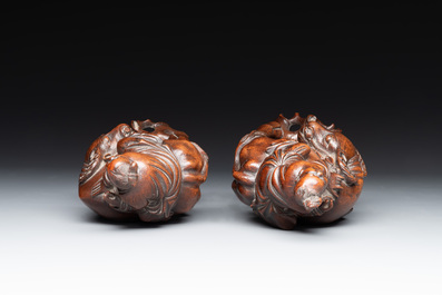 A pair of Chinese carved bamboo groups of a boy riding a buffalo, 19/20th C.