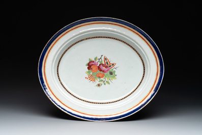 A Chinese export famille rose covered tureen and an oval dish with strainer, Jiaqing