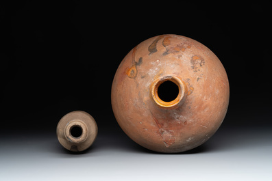 A collection of 9 German proto stoneware jugs and vessels, 14th C.