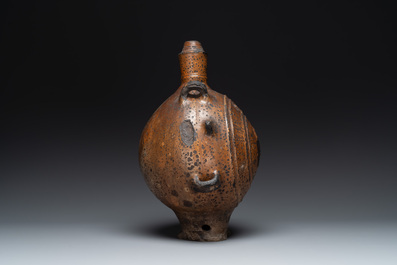 Five stoneware jugs or pilgrim flasks, including a Raeren example with armorial design, 16/17th C. and later