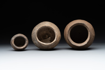 A collection of 9 German proto stoneware jugs and vessels, 14th C.