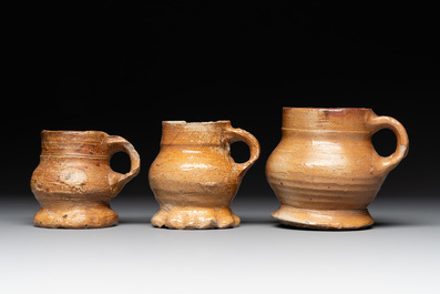 A collection of 10 German stoneware mugs, 14/16th C.