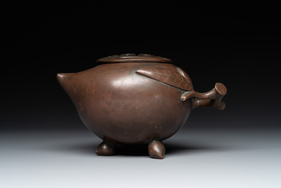 A Chinese bronze camel-form paperweight and a peach-shaped covered censer, 19th C.