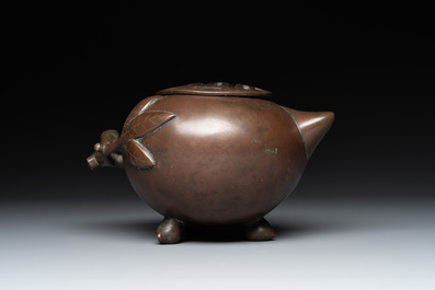 A Chinese bronze camel-form paperweight and a peach-shaped covered censer, 19th C.