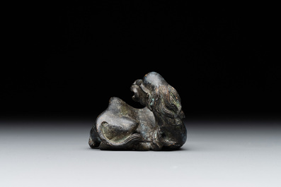 A Chinese bronze camel-form paperweight and a peach-shaped covered censer, 19th C.