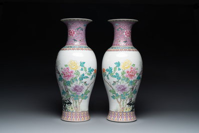 A pair of Chinese famille rose vases and two vases, Qianlong mark, 20th C.