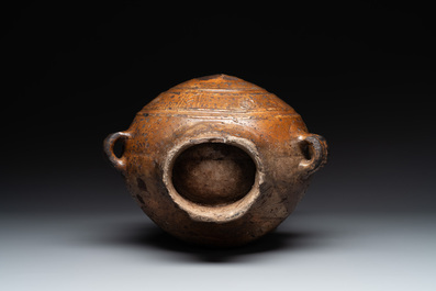 Five stoneware jugs or pilgrim flasks, including a Raeren example with armorial design, 16/17th C. and later