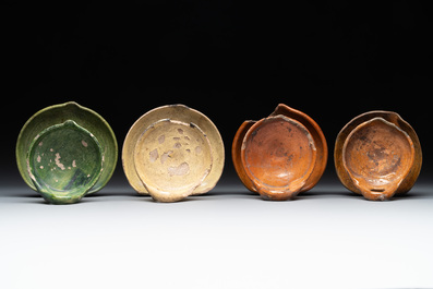 14 green, yellow and brown-glazed pottery wares, Western Europe, 16th C. and later