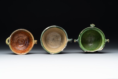 14 green, yellow and brown-glazed pottery wares, Western Europe, 16th C. and later