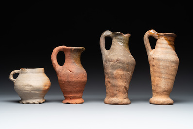 A collection of 9 German proto stoneware jugs and vessels, 14th C.