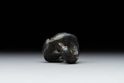 A Chinese bronze camel-form paperweight and a peach-shaped covered censer, 19th C.