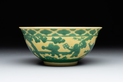 An imperial Chinese green-enamelled yellow-ground 'playing boys' bowl, Yongzheng mark and of the period
