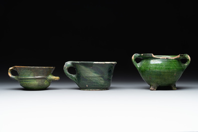 14 green, yellow and brown-glazed pottery wares, Western Europe, 16th C. and later