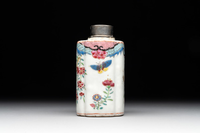 A Chinese famille rose tea caddy, two covered milk jugs and three vases, Yongzheng/Qianlong