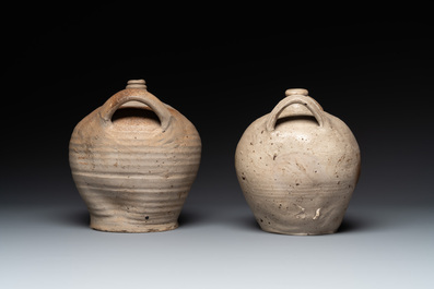 Five stoneware jugs or pilgrim flasks, including a Raeren example with armorial design, 16/17th C. and later