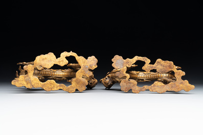 A pair of Chinese gilt bronze dragons among flames and clouds, 19/20th C.