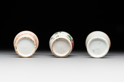 A Chinese famille rose tea caddy, two covered milk jugs and three vases, Yongzheng/Qianlong