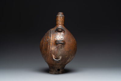 Five stoneware jugs or pilgrim flasks, including a Raeren example with armorial design, 16/17th C. and later
