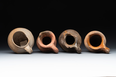 A collection of 9 German proto stoneware jugs and vessels, 14th C.