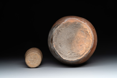 A collection of 9 German proto stoneware jugs and vessels, 14th C.