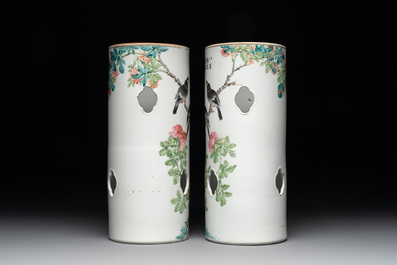 A pair of Chinese famille rose hat stands with birds among flowering branches, signed Zhu Shaoquan 朱少泉, dated 1892