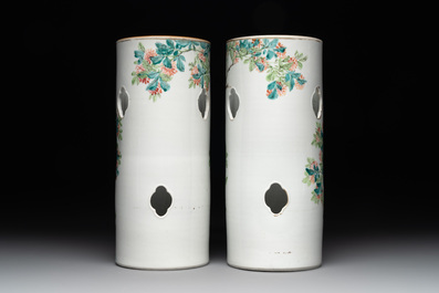 A pair of Chinese famille rose hat stands with birds among flowering branches, signed Zhu Shaoquan 朱少泉, dated 1892