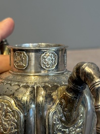 A Chinese parcel-gilt silver wine ewer for the Peranakan or Straits market,  Xuan Huang Hao 炫煌號 and An Yi Zao 安益造 mark, 19/20th C.