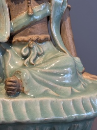 A Chinese Longquan celadon Guanyin, Ming or later