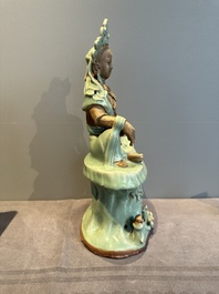 A Chinese Longquan celadon Guanyin, Ming or later