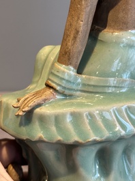 A Chinese Longquan celadon Guanyin, Ming or later