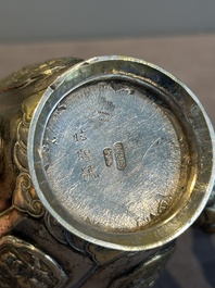 A Chinese parcel-gilt silver wine ewer for the Peranakan or Straits market,  Xuan Huang Hao 炫煌號 and An Yi Zao 安益造 mark, 19/20th C.