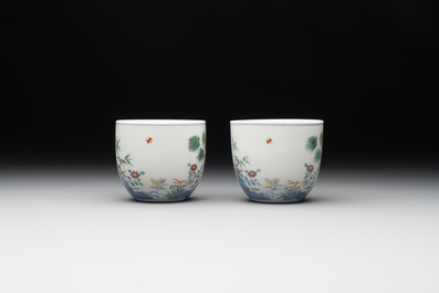 A pair of extremely rare imperial Chinese doucai 'chicken' cups, Chenghua mark, Yongzheng/Qianlong