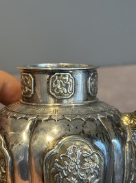 A Chinese parcel-gilt silver wine ewer for the Peranakan or Straits market,  Xuan Huang Hao 炫煌號 and An Yi Zao 安益造 mark, 19/20th C.