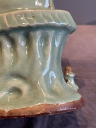 A Chinese Longquan celadon Guanyin, Ming or later