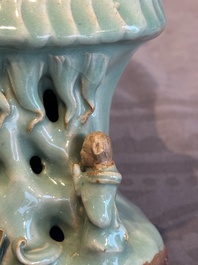 A Chinese Longquan celadon Guanyin, Ming or later