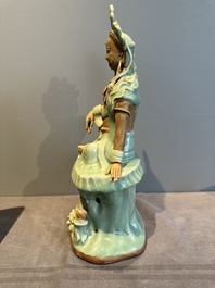 A Chinese Longquan celadon Guanyin, Ming or later
