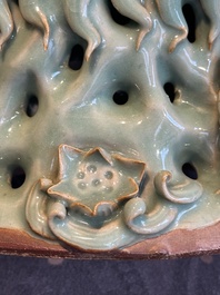 A Chinese Longquan celadon Guanyin, Ming or later