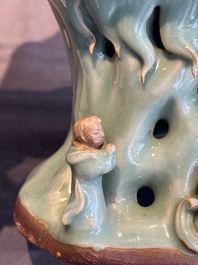A Chinese Longquan celadon Guanyin, Ming or later