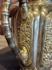 A Chinese parcel-gilt silver wine ewer for the Peranakan or Straits market,  Xuan Huang Hao 炫煌號 and An Yi Zao 安益造 mark, 19/20th C.